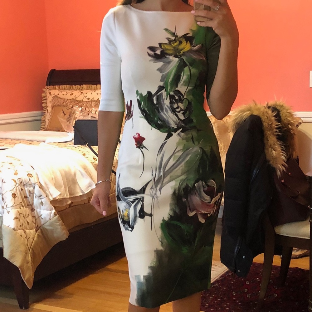 Dress white and green with flowers size 2, taken in fits more of a 0